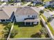 Aerial view showcasing house, backyard, and neighborhood at 5361 Ragusa Loop, Saint Cloud, FL 34771