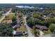 House in residential neighborhood near a lake, aerial view at 5851 Edouard St, Oviedo, FL 32765