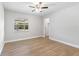 Bright bedroom with hardwood floors and a ceiling fan at 5851 Edouard St, Oviedo, FL 32765