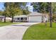 Curved driveway leading to a remodeled house at 5851 Edouard St, Oviedo, FL 32765