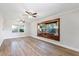 Living room featuring hardwood floors and a built-in window seat at 5851 Edouard St, Oviedo, FL 32765