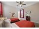 ' themed bedroom with two twin beds, Mickey Mouse wall decor, and a TV at 8942 Cabot Cliffs Dr, Davenport, FL 33896