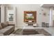 Living room featuring comfortable seating, a large television, and stylish decor at 8942 Cabot Cliffs Dr, Davenport, FL 33896