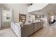 Spacious open-concept living room with high ceilings and modern furniture at 8942 Cabot Cliffs Dr, Davenport, FL 33896