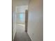 Hallway with carpeted floors and neutral walls at 911 N Orange Ave # 327, Orlando, FL 32801