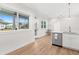 Bright kitchen features a view and stainless steel appliances at 12071 Lakeshore Way, Oxford, FL 34484