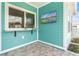 Outdoor bar area with granite countertop and a scenic view at 12071 Lakeshore Way, Oxford, FL 34484