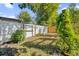 Backyard with lush greenery and wooden fence at 1915 Weber St, Orlando, FL 32803