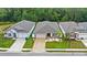 Aerial view of a residential home with a fenced yard and driveway at 2069 Canton Park Dr, Winter Haven, FL 33881