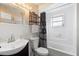 Clean bathroom with tub shower combo and updated vanity at 2310 Fairgren Ave, Deltona, FL 32738