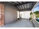 Covered patio with concrete flooring and potted plants at 2310 Fairgren Ave, Deltona, FL 32738