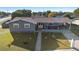 House front view, showing landscaping and walkway at 2310 Fairgren Ave, Deltona, FL 32738
