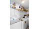 Laundry room with washer, dryer, and shelving at 2310 Fairgren Ave, Deltona, FL 32738