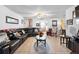 Large living room with sectional sofa and wood coffee table at 2310 Fairgren Ave, Deltona, FL 32738