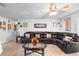 Spacious living room with sectional sofa and ceiling fan at 2310 Fairgren Ave, Deltona, FL 32738