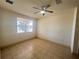 Bright bedroom with neutral walls and carpet flooring at 2404 Bella Vista Dr, Davenport, FL 33897