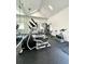 Bright fitness center with cardio and weight training equipment at 2504 Woodgate Blvd # 107, Orlando, FL 32822