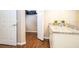 Bathroom vanity with granite countertop and view of walk-in closet at 2901 Edenshire Way # 104, Kissimmee, FL 34746