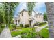 Attractive townhome with landscaped yard and walkway at 2901 Edenshire Way # 104, Kissimmee, FL 34746