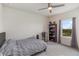 Comfortable bedroom with a double bed and window at 4150 Sunset Preserve Blvd, Orlando, FL 32820