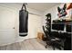 Functional bedroom with a heavy bag, gaming setup, and closet at 5427 Hanover Square Dr, St Cloud, FL 34771