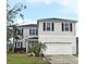 Two-story house with attached garage at 5427 Hanover Square Dr, St Cloud, FL 34771
