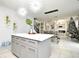 Kitchen island with white countertop and gray cabinets at 5427 Hanover Square Dr, St Cloud, FL 34771