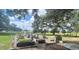 Community garden with raised beds at 12133 Grand Oak Ln, Oxford, FL 34484