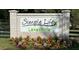 Simple Life Lakeshore community entrance sign at 12133 Grand Oak Ln, Oxford, FL 34484