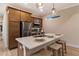 Modern kitchen with wood cabinets and quartz countertops at 12133 Grand Oak Ln, Oxford, FL 34484