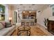 Open kitchen with island and stainless steel appliances at 12133 Grand Oak Ln, Oxford, FL 34484