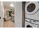 Stackable washer and dryer in convenient laundry closet at 12133 Grand Oak Ln, Oxford, FL 34484