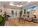 Living area with comfy seating and a view to the outdoors at 12133 Grand Oak Ln, Oxford, FL 34484