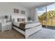 Main bedroom with private balcony and ensuite at 17417 Placidity Ave, Clermont, FL 34714