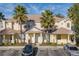 Front view of charming townhome with two parking spaces at 17417 Placidity Ave, Clermont, FL 34714