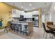 Modern kitchen with breakfast bar and stainless steel appliances at 17417 Placidity Ave, Clermont, FL 34714