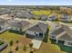 Aerial view of house with backyard patio at 236 Denali St, Haines City, FL 33844