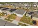 Aerial view showcasing house and surrounding homes at 236 Denali St, Haines City, FL 33844