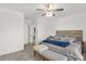 Comfortable bedroom with a king-size bed and access to the bathroom at 236 Denali St, Haines City, FL 33844