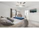 Bright bedroom with king-size bed and en-suite bathroom at 236 Denali St, Haines City, FL 33844