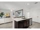 Modern kitchen with an island and stainless steel appliances at 236 Denali St, Haines City, FL 33844
