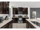 Modern kitchen featuring stainless steel appliances and a gas stove at 236 Denali St, Haines City, FL 33844