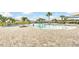 Community pool with brick pavers and lounge chairs at 236 Denali St, Haines City, FL 33844