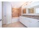 Bathroom with double vanity, granite countertop and a shower/tub combo at 441 Tallow Wood Cir, Debary, FL 32713