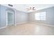 Bedroom with tile floors and access to another room at 441 Tallow Wood Cir, Debary, FL 32713