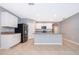 Modern kitchen with stainless steel appliances and granite countertops at 441 Tallow Wood Cir, Debary, FL 32713