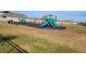 Community playground with swings and slides at 441 Tallow Wood Cir, Debary, FL 32713