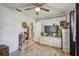 Bedroom with wood-look floors and built-in shelving at 800 Lighthouse Cv, Sanford, FL 32773