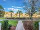 Landscaped front yard with brick walkway and neighborhood view at 8976 Hildreth Ave, Orlando, FL 32832