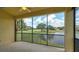 Screened balcony overlooking golf course and lake at 9322 Avenida San Pablo # 14D, Howey In The Hills, FL 34737